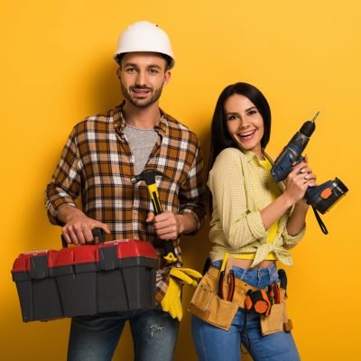 smiling-manual-workers-holding-toolbox-and-electri-2024-11-17-17-23-43-utc_11zon.jpg