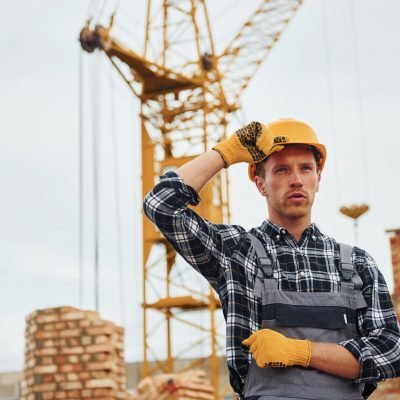 with-arms-crossed-construction-worker-in-uniform-2023-11-27-05-30-36-utc.jpg